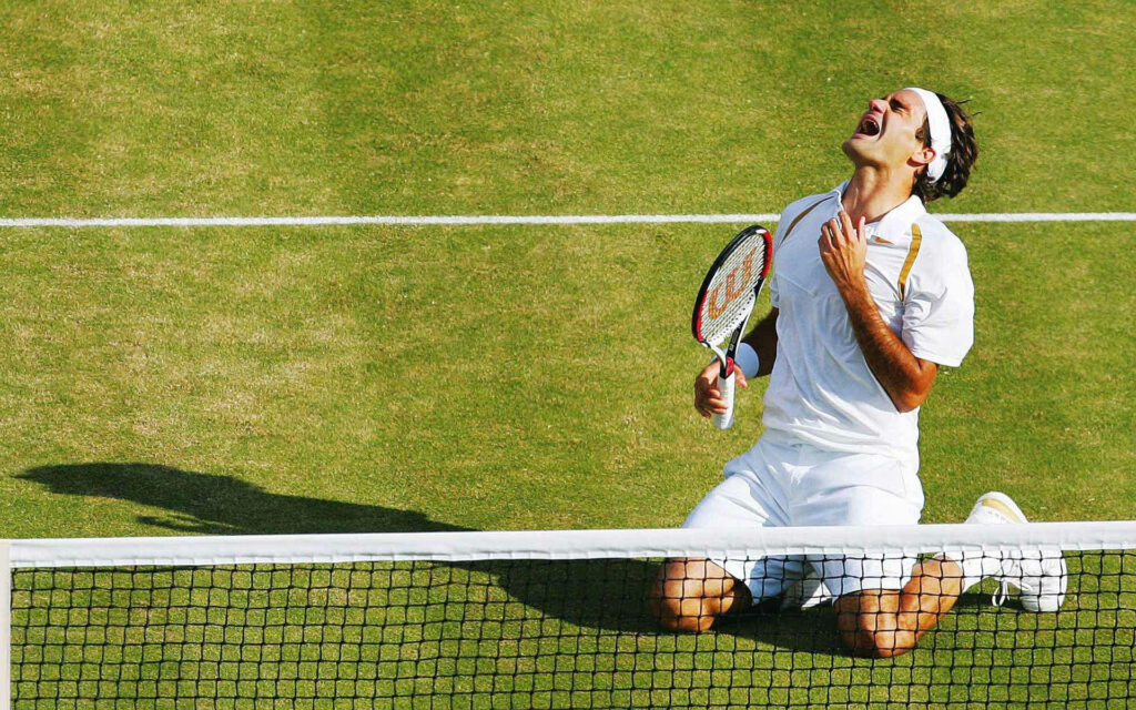 Roger Federer Celebrates 2007 Wimbledon Victory - Iconic Grass Court Wallpaper