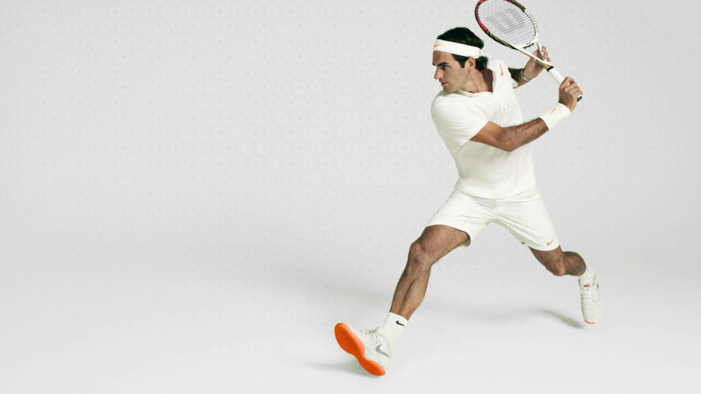 Elegant Roger Federer: Agile Excellence on the Tennis Court Wallpaper