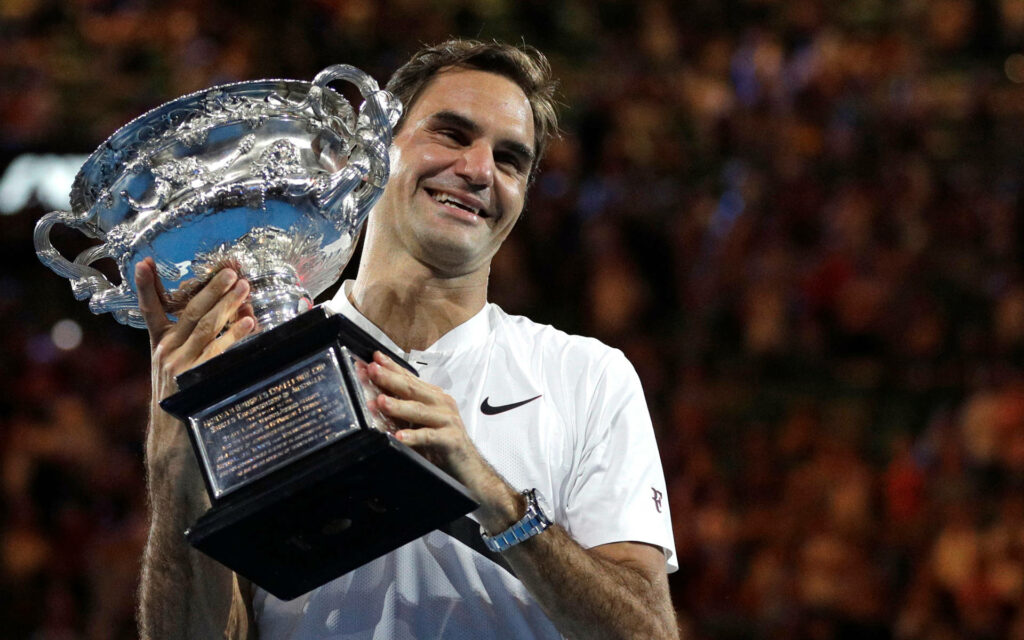 Roger Federer Celebrates Grand Slam Victory - Iconic Tennis Wallpaper