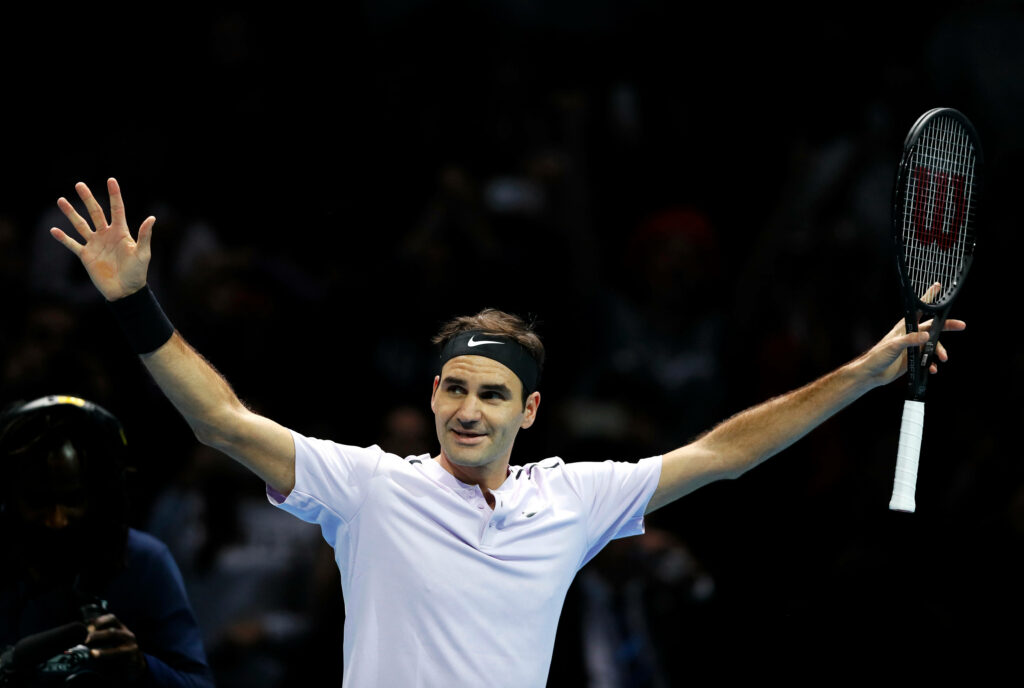 Roger Federer Celebrating: Dynamic Tennis Wallpaper Background