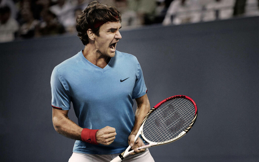 Dynamic Roger Federer Wallpaper: Intense Tennis Moment in Nike