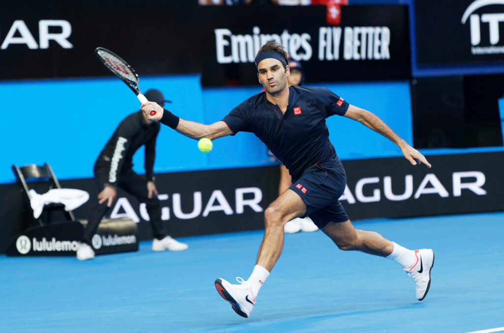 Dynamic Wallpaper: Roger Federer in Action on the Tennis Court