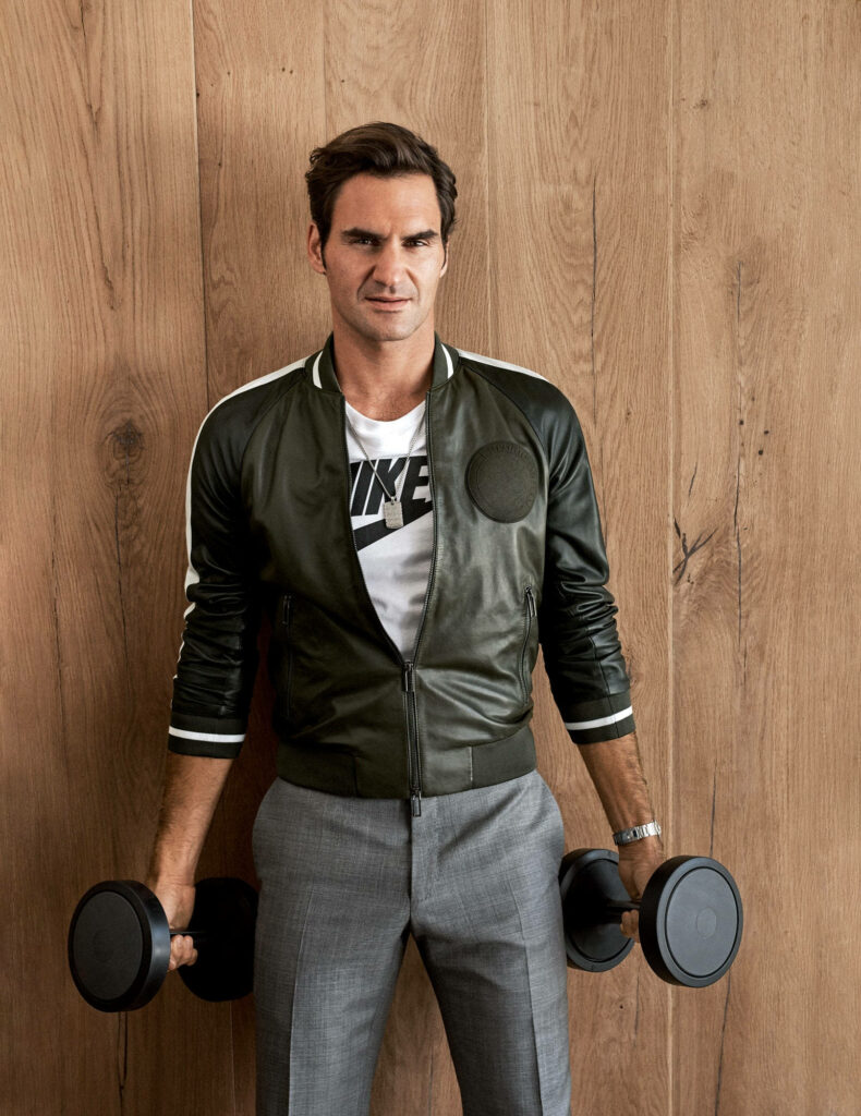 Roger Federer: Sophisticated Charm in a Bomber Jacket Wallpaper