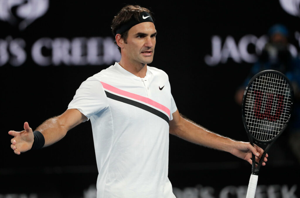 Roger Federer Tennis Wallpaper: Iconic Athlete in Action