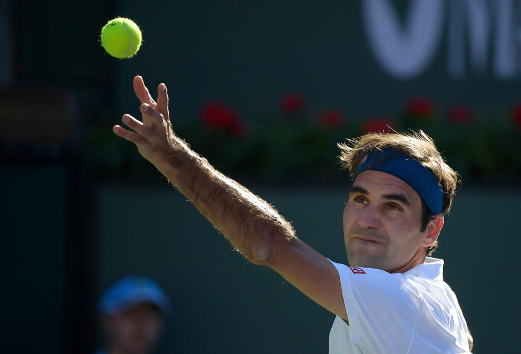 Roger Federer Tennis Wallpaper: Perfect Serve Action Background