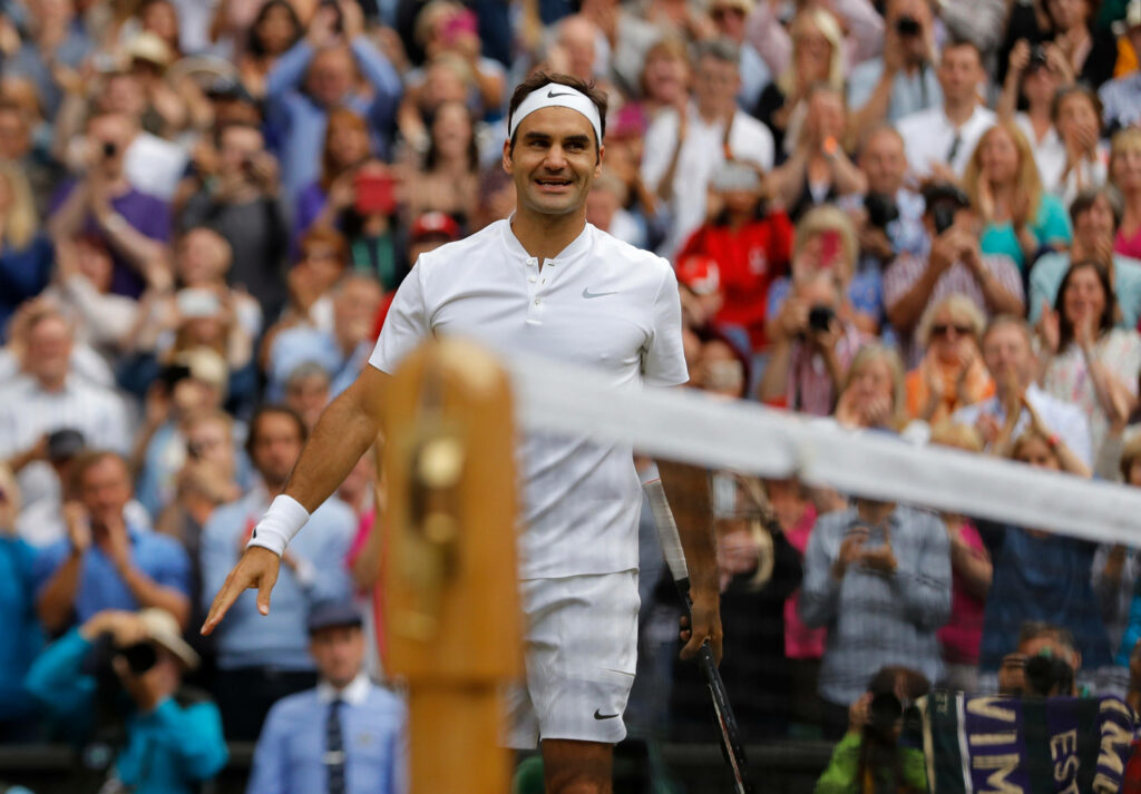 Roger Federer Wallpaper: Tennis Legend Exuding Confidence in Action