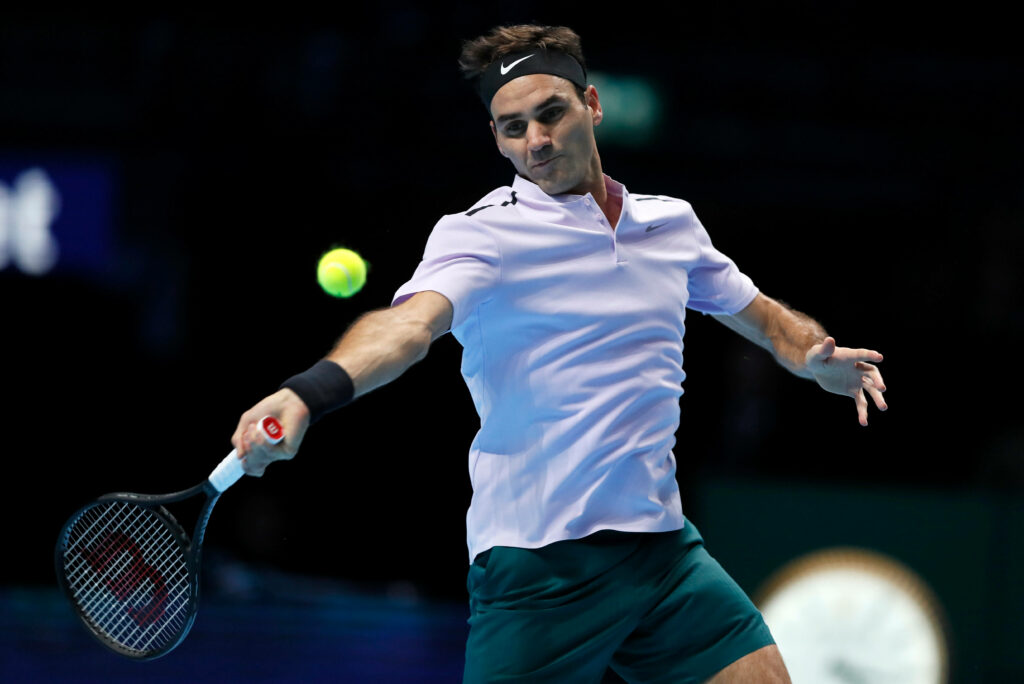 Roger Federer: Elegant Forehand Tennis Wallpaper Background