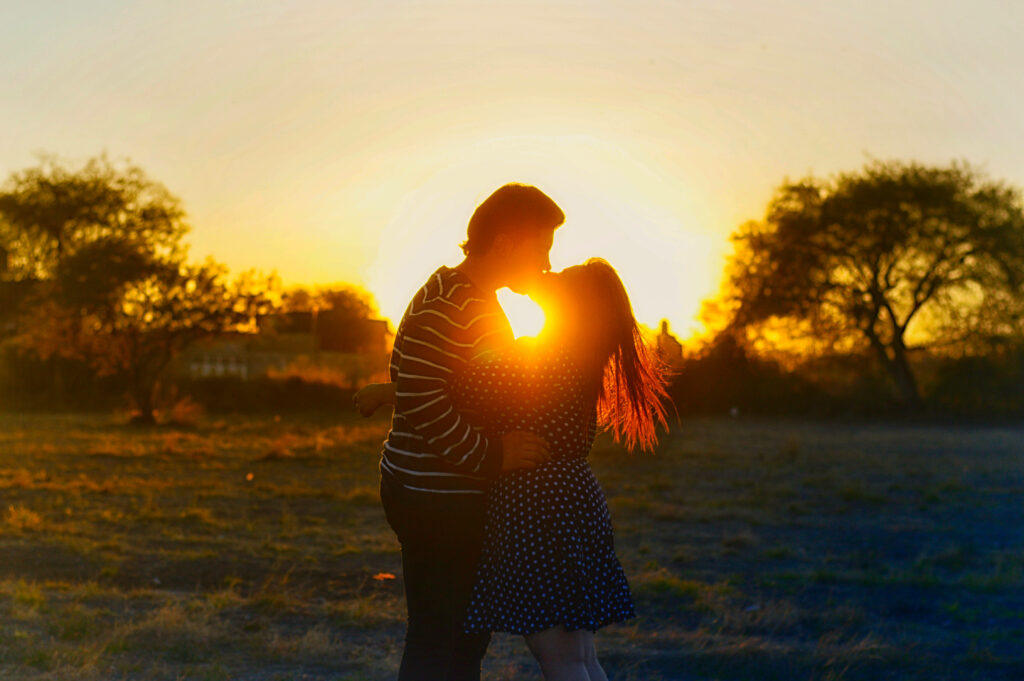 Romantic Bliss: Embracing Love in the Enchanting Fields Wallpaper
