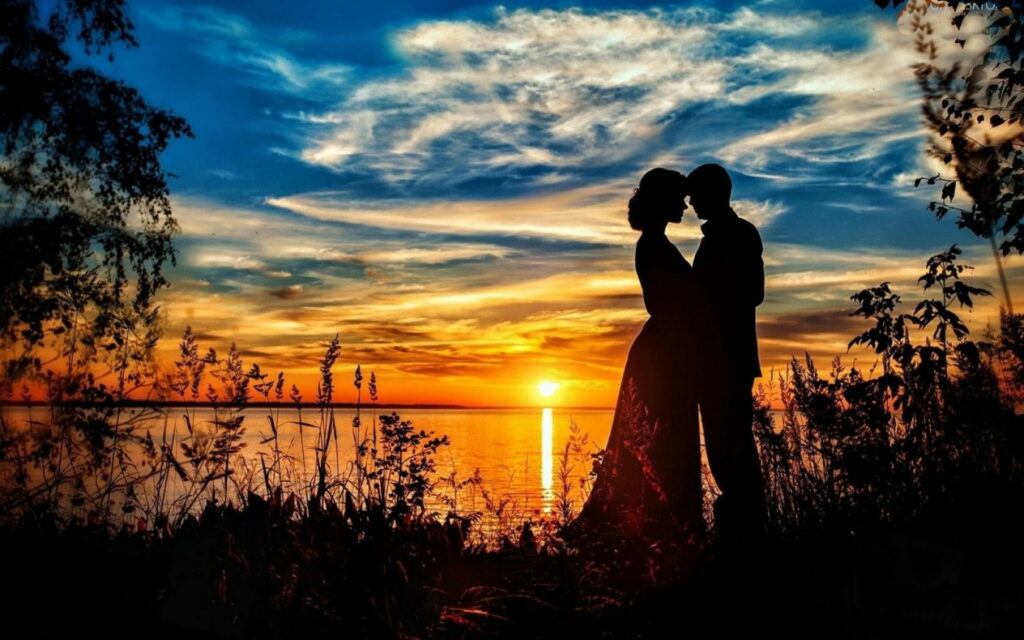 Silhouette: A Serene Sunset Path for Lovebirds Wallpaper