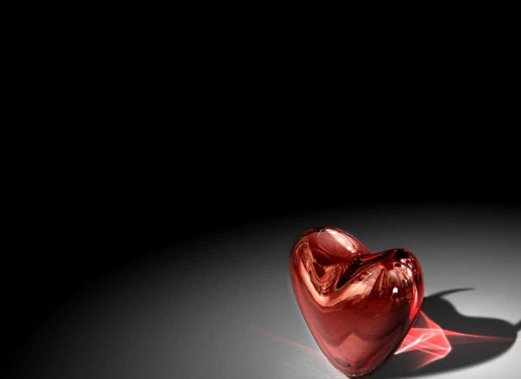 Glossy Red Heart Wallpaper: A Romantic Background of Love & Passion