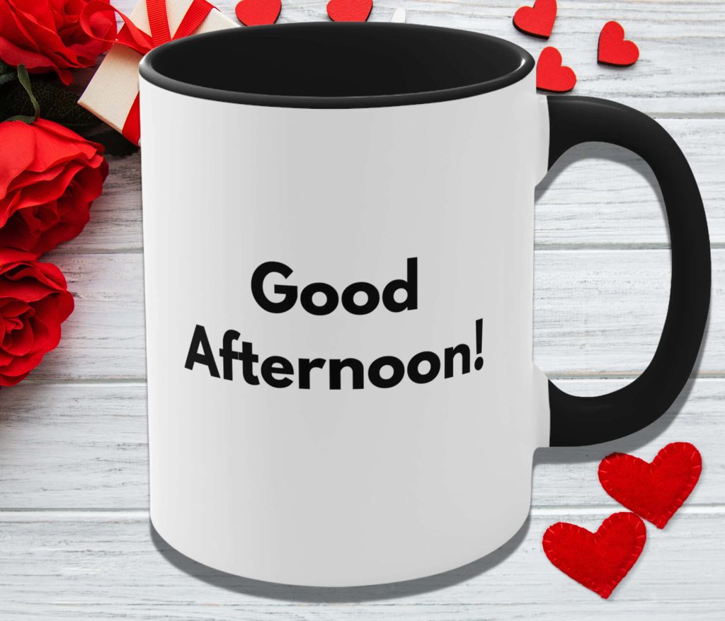 White coffee mug with Good Afternoon text surrounded by red roses gift box and hearts on wood Wallpaper