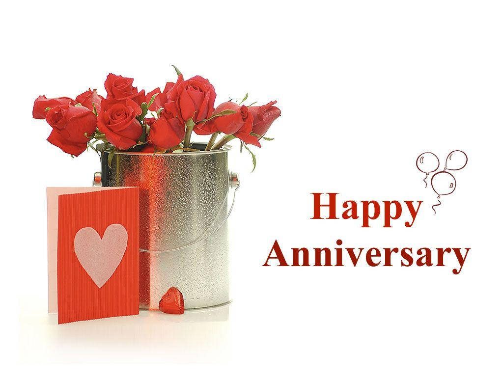 Happy Anniversary wallpaper silver bucket red roses heart card red heart candy white background