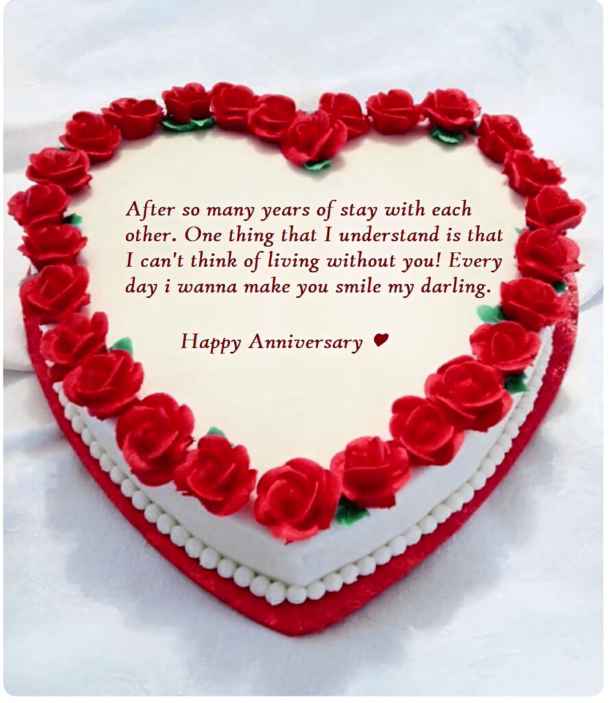 Heart-shaped anniversary cake with red roses and love message anniversary wallpaper background
