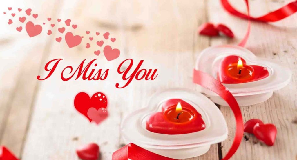 Romantic I Miss You wallpaper with glowing heart candles red ribbons rustic wooden background
