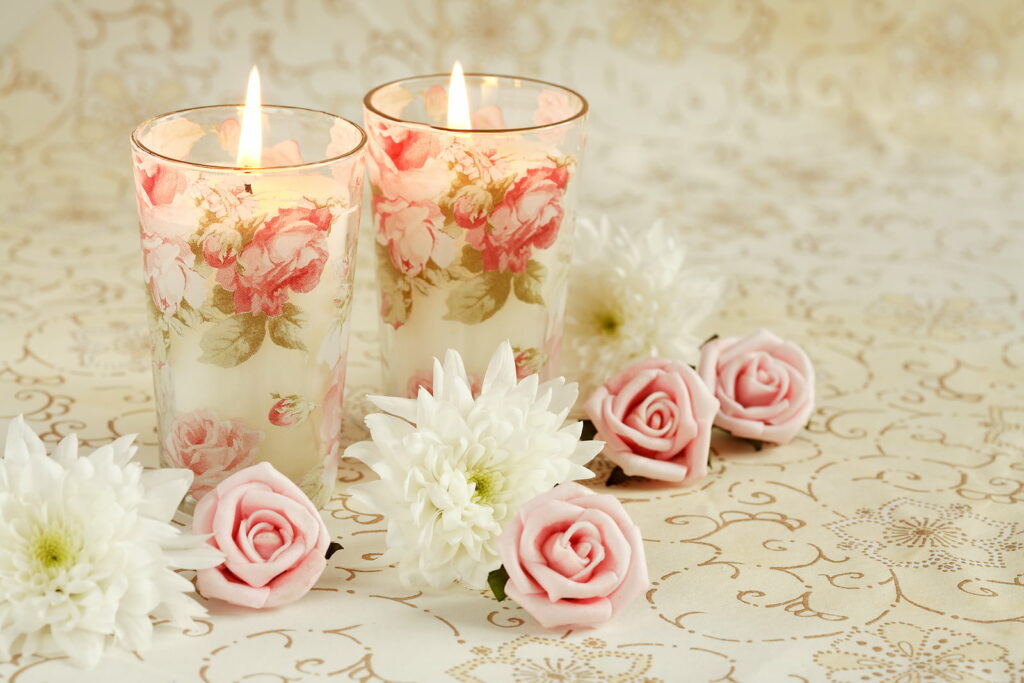 Enchanting Ambiance: A Captivating Scene of Romantic Candlelit Bliss with Roses Wallpaper
