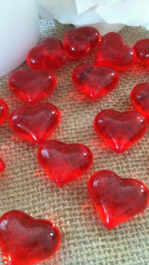 Romantic Red Heart-Shaped Glass Beads Wallpaper Background