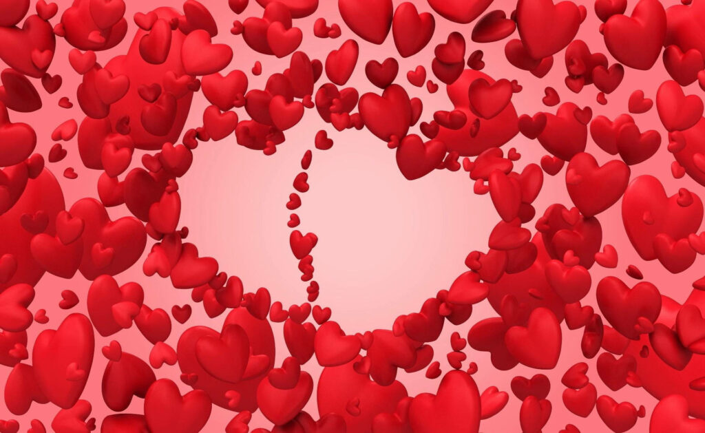 Romantic Red Hearts Wallpaper: Captivating Design on Soft Pink Background