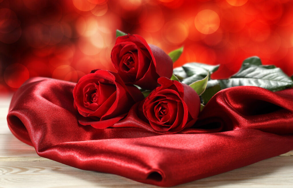 Romantic Red Rose Bouquet on Silken Bokeh Backdrop - Captivating Valentine's Day Floral Composition Wallpaper