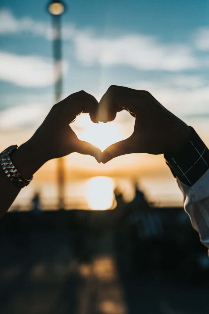 Romantic Sunset Heart Hands Wallpaper - Love & Connection