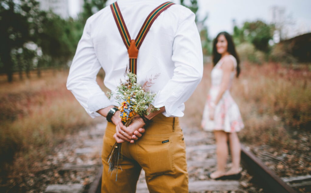 Love Blooms: A Romantic Outdoor Surprise for a Couple Wallpaper