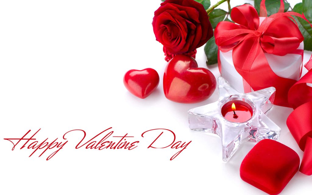 Valentines Day wallpaper with red rose gift box heart accents and glowing star candle on white background
