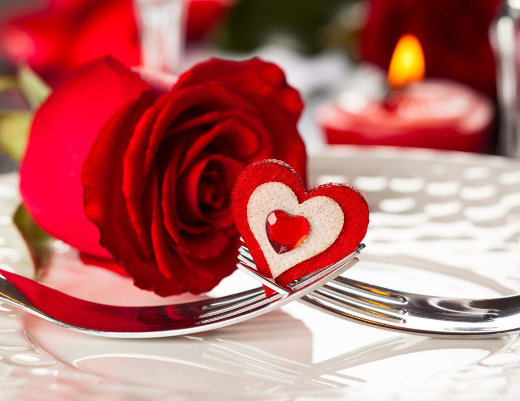 Romantic Valentine's Table Setting with Red Roses & Candlelight Wallpaper