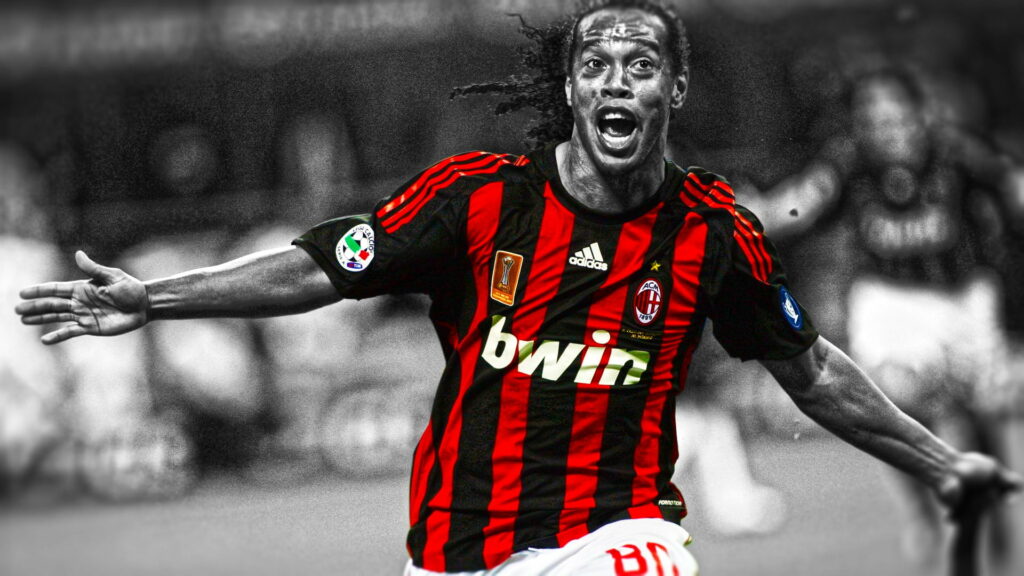 Dazzling Football Genius: Ronaldinho Lighting Up the Field at A.C. Milan Wallpaper