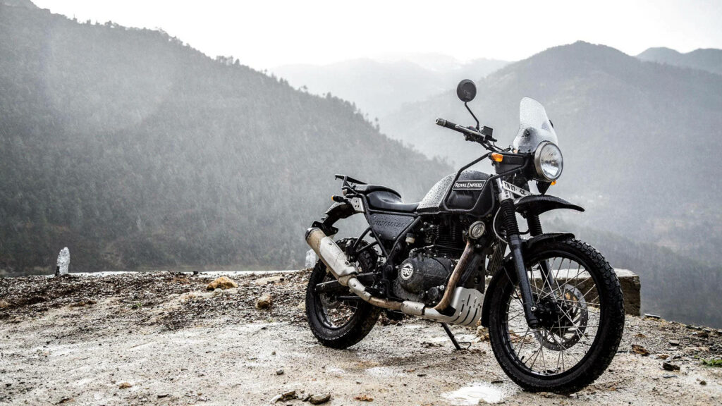Stunning Royal Enfield Himalayan Wallpaper: Adventure on the Cliff