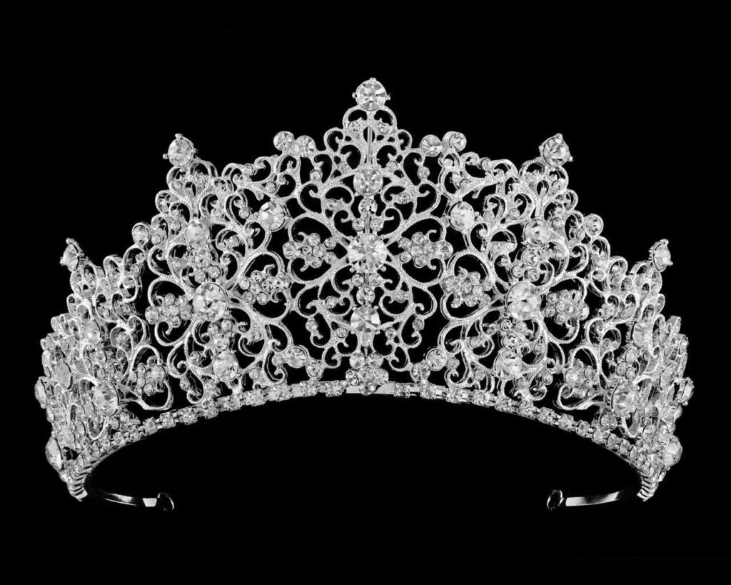 Royal Rhinestones Bridal Crown with silver filigree sparkling against black elegant wallpaper background