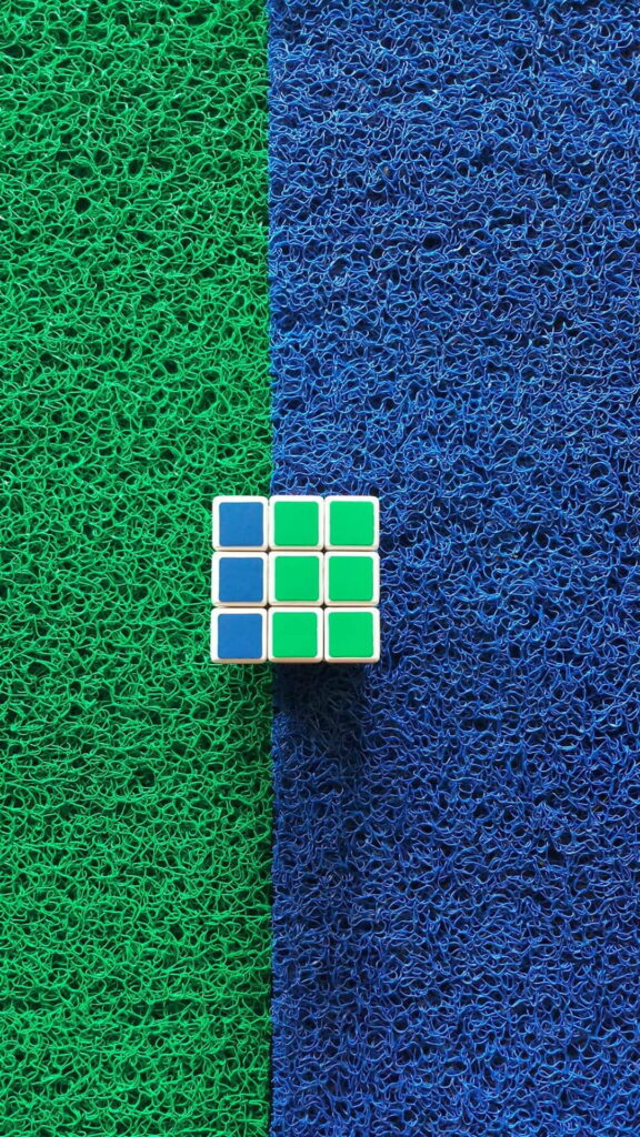 Revving Up Your Brain: Rubik's Games in HD Phone Wallpaper Background Photo