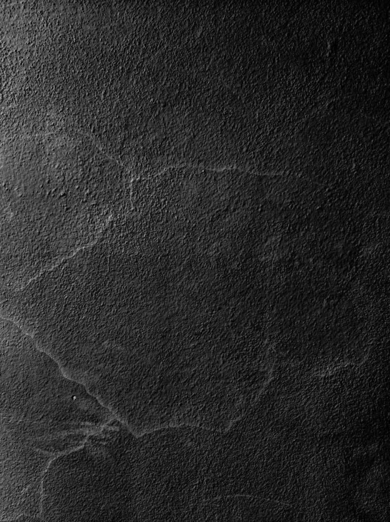 Rugged Black Leather and Concrete Wallpaper Background