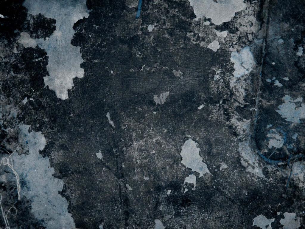 Rugged Black Metal Grunge Texture: Distressed Industrial Wallpaper