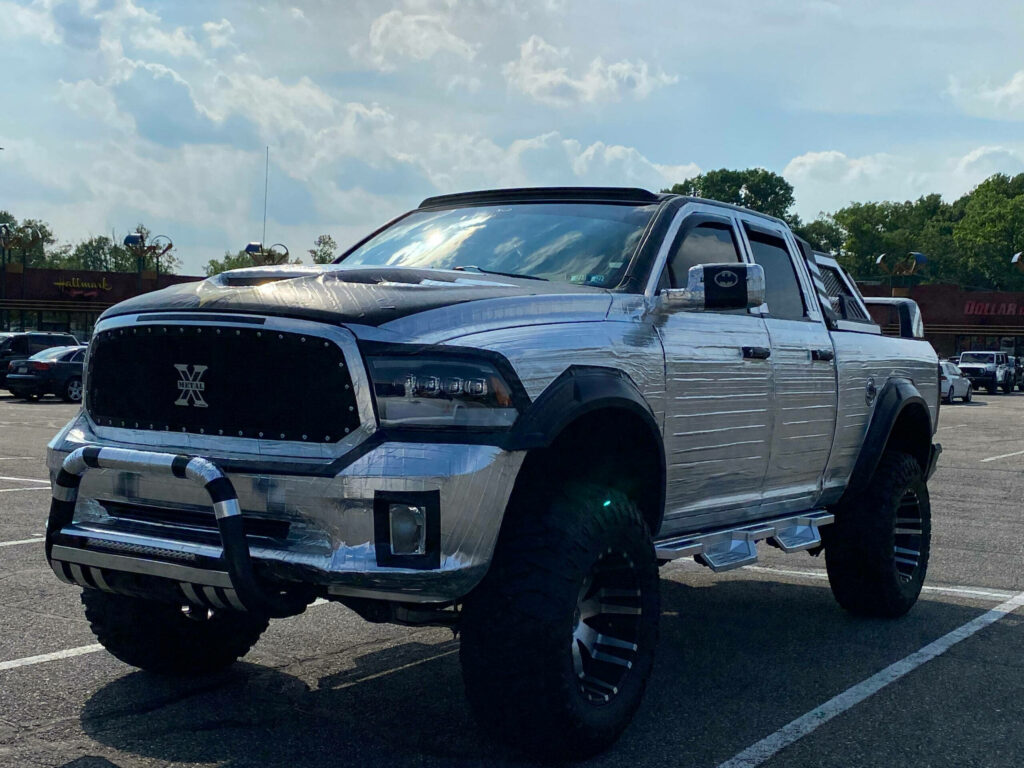 Striking Metallic RAM Pickup Wallpaper: Rugged, Customized & Bold