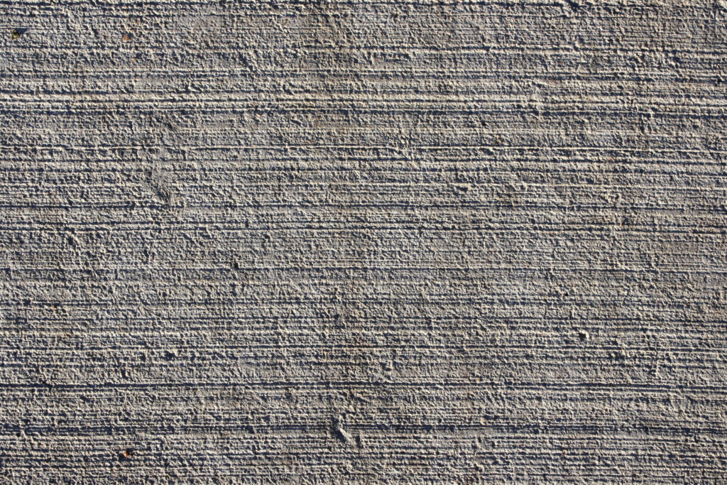 “Rugged Grey Concrete Texture with Horizontal Lines for Wallpaper”