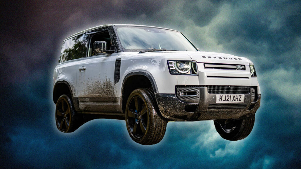 Adventure Awaits: Land Rover Defender Off-Road Wallpaper Background