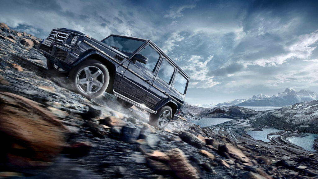 Rugged Adventure: The Rover Ranger Conquering Treacherous Mud on a Rocky Road - 4k Ultra HD Windows Background Wallpaper