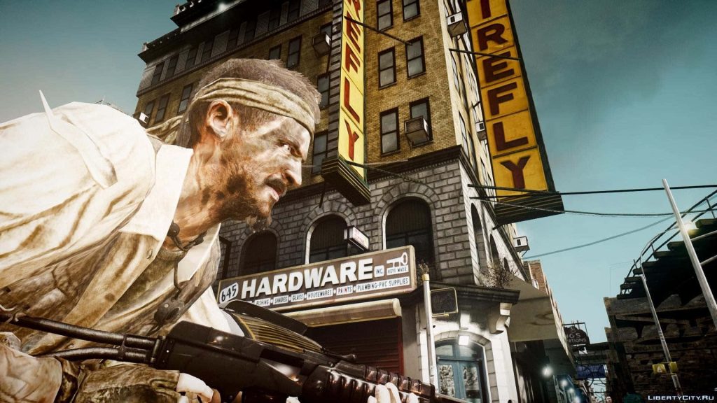 Rugged armed survivor with bandana on urban street near Firefly Hardware brick building wallpaper