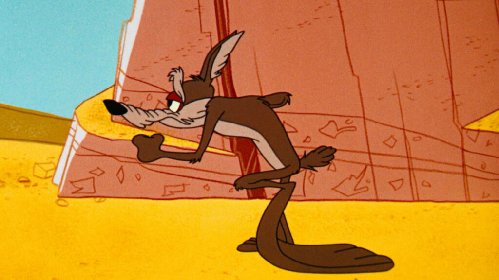 Exhausted Pursuit: Wile E Coyote Races to the Finish Line Wallpaper