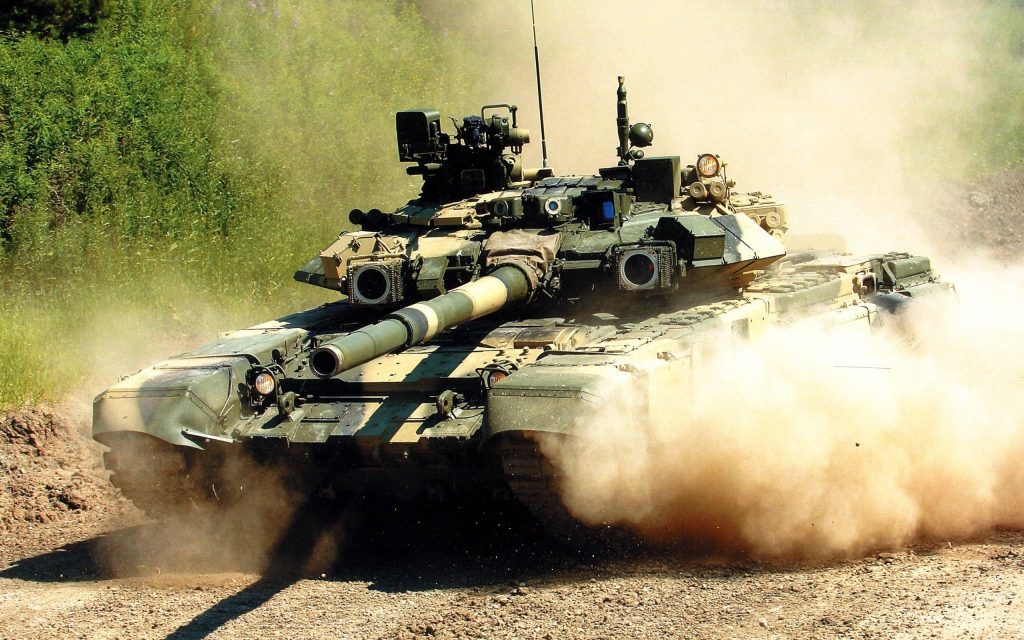 Russian T-90 tank with Shtora-1 system kicking up dust on rural track high-resolution wallpaper