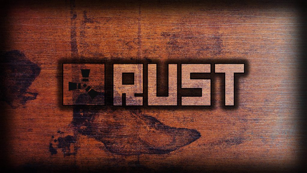 Rust game logo on weathered oxidized metal texture dark industrial survival wallpaper