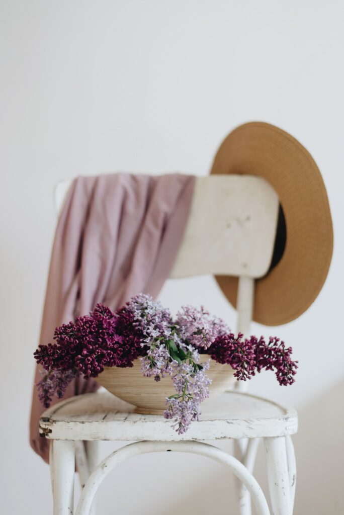 Serene Aesthetic Wallpaper: Rustic Chair with Lilac Accents