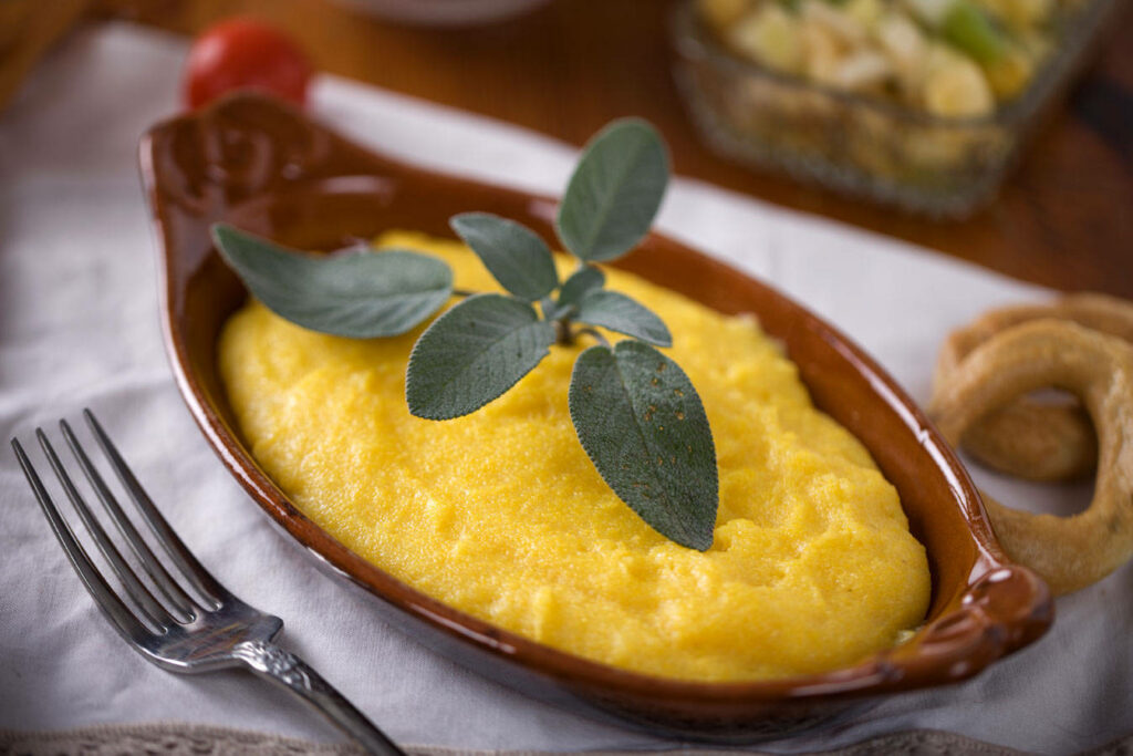 Rustic Baked Polenta Wallpaper with Fresh Sage Background
