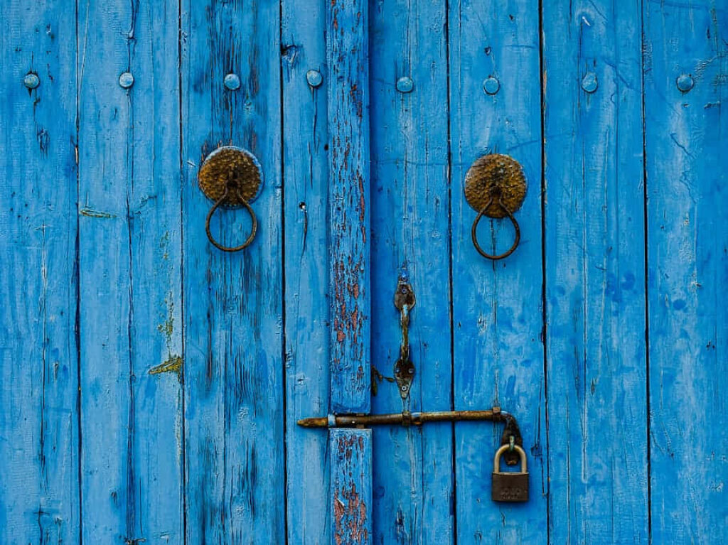 Charming Rustic Blue Gate with Antique Details and Vintage Nostalgia Wallpaper