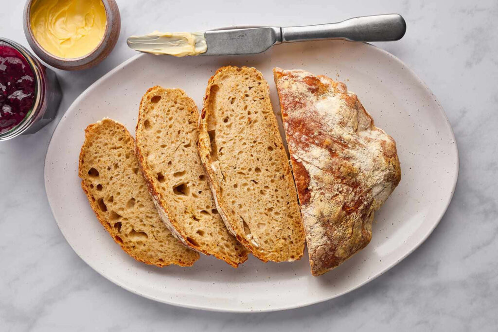 Rustic Crusty Bread Slices with Butter & Jam - Wallpaper Background