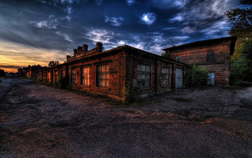 Rustic Brick Building HDR Wallpaper with Dramatic Dusk Sky