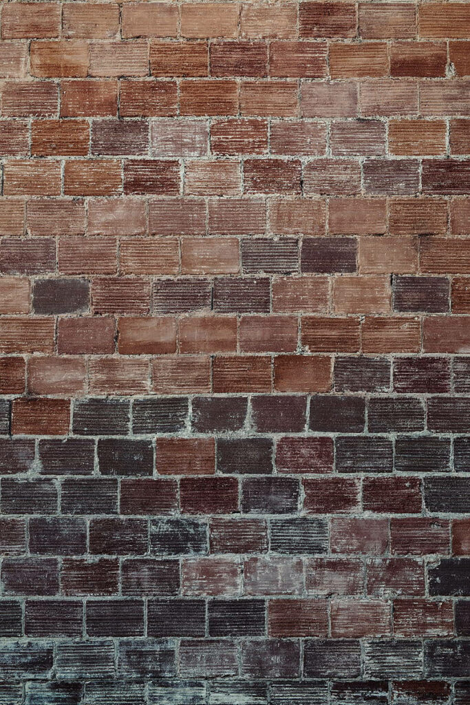 Rustic Brick Texture Wallpaper: Earthy Red & Brown Vintage Background