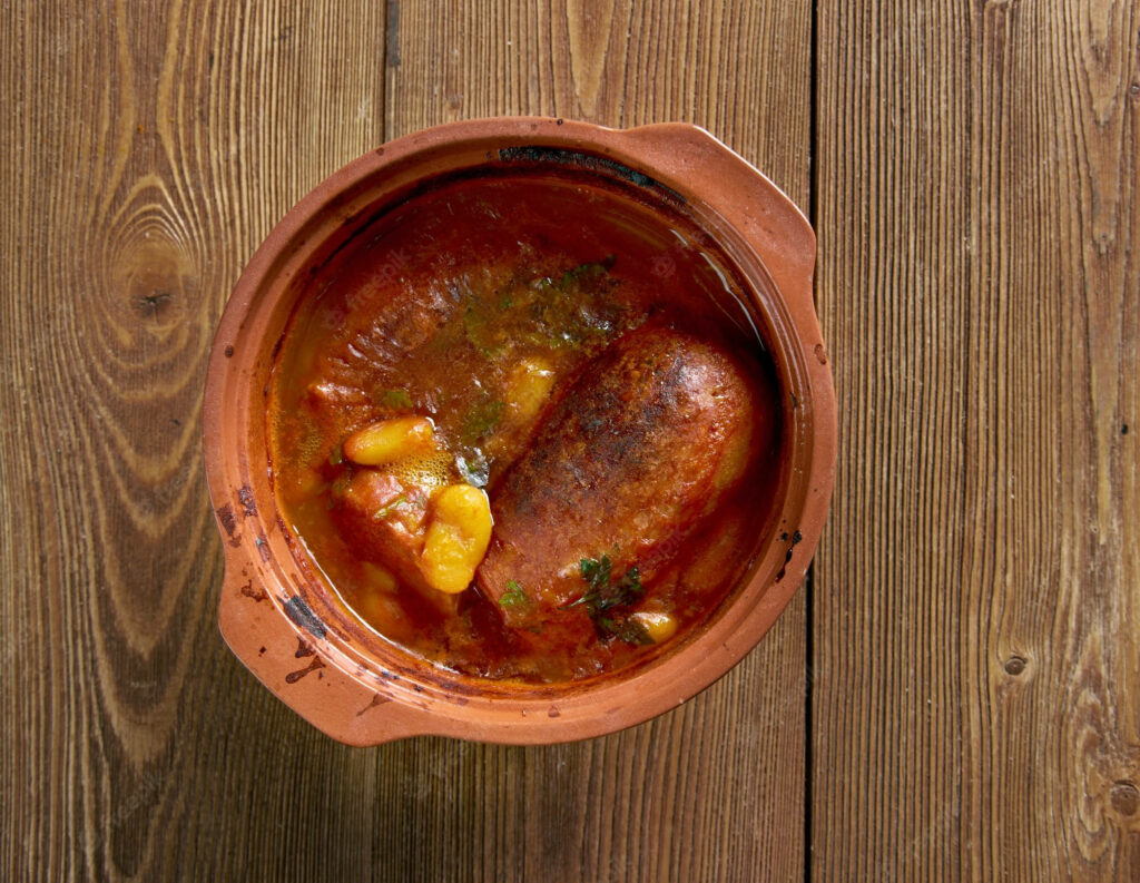 Rustic Cassoulet Stew Flat Lay | Hearty Tomato, Sausages & Beans Wallpaper