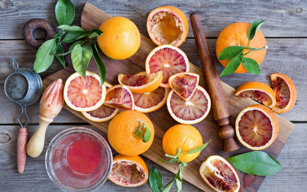 Vibrant Citrus Wallpaper: Rustic Oranges & Grapefruits Theme