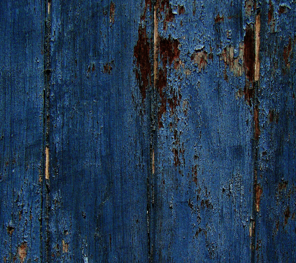 Rustic Cracked Blue Paint Wallpaper: Vintage Textured Background