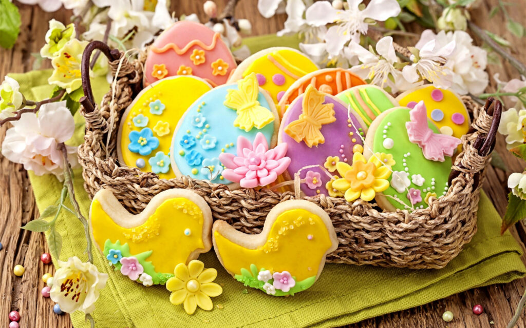 Rustic basket with colorful Easter egg butterfly bird cookies pastel floral spring wallpaper background